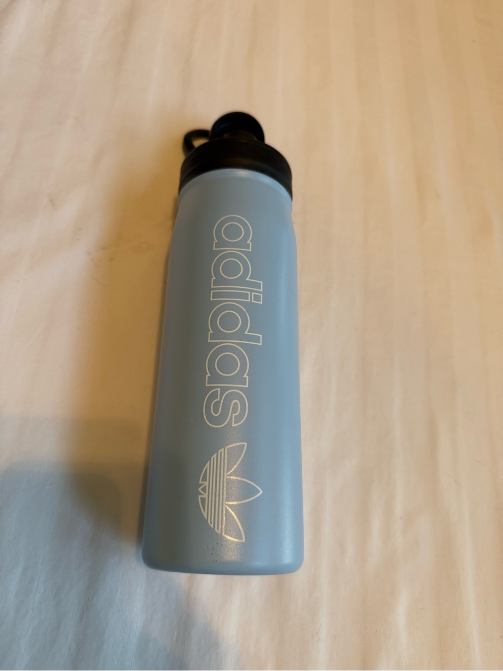 Adidas Light Blue Water Bottle This water bottle has a capacity of 20 oz (600 ml